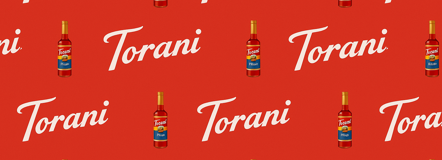 red banner with Torani branding and mini syrup bottles